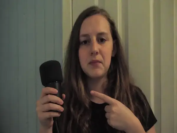 Creator demonstrating an audio recording affected by buzzing